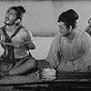 Toshirô Mifune, Minoru Chiaki, and Takashi Shimura in Rashômon (1950)