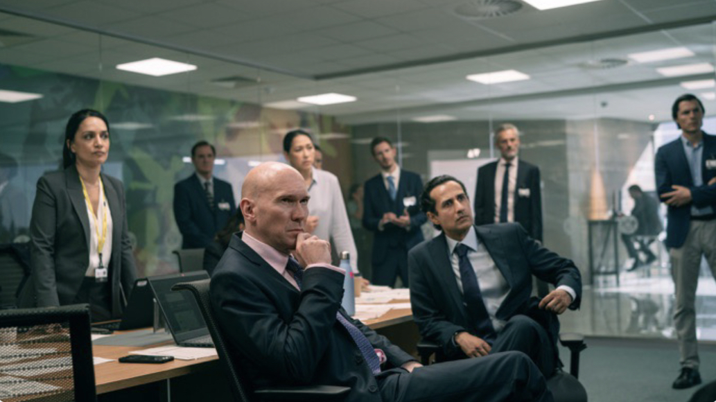 Archie Panjabi, Alex Macqueen, and Abhin Galeya in Hijack (2023)