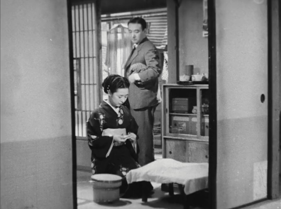 Masao Mishima and Kinuyo Tanaka in Ginza keshô (1951)