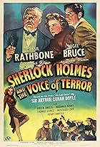 Basil Rathbone, Evelyn Ankers, and Nigel Bruce in Sherlock Holmes and the Voice of Terror (1942)