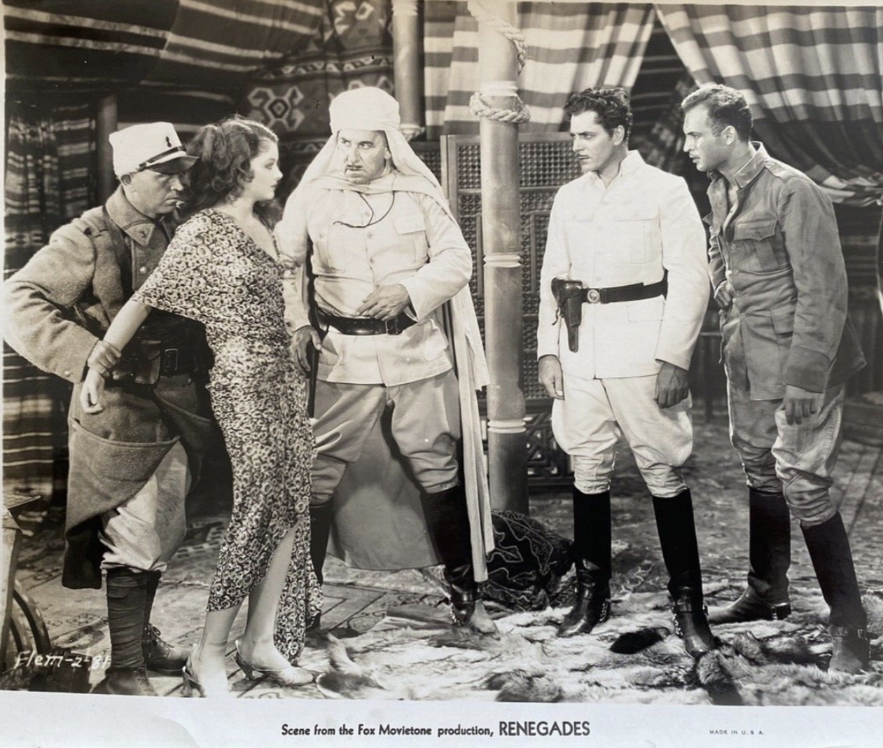 Myrna Loy, Noah Beery, Warner Baxter, George Cooper, and Gregory Gaye in Renegades (1930)