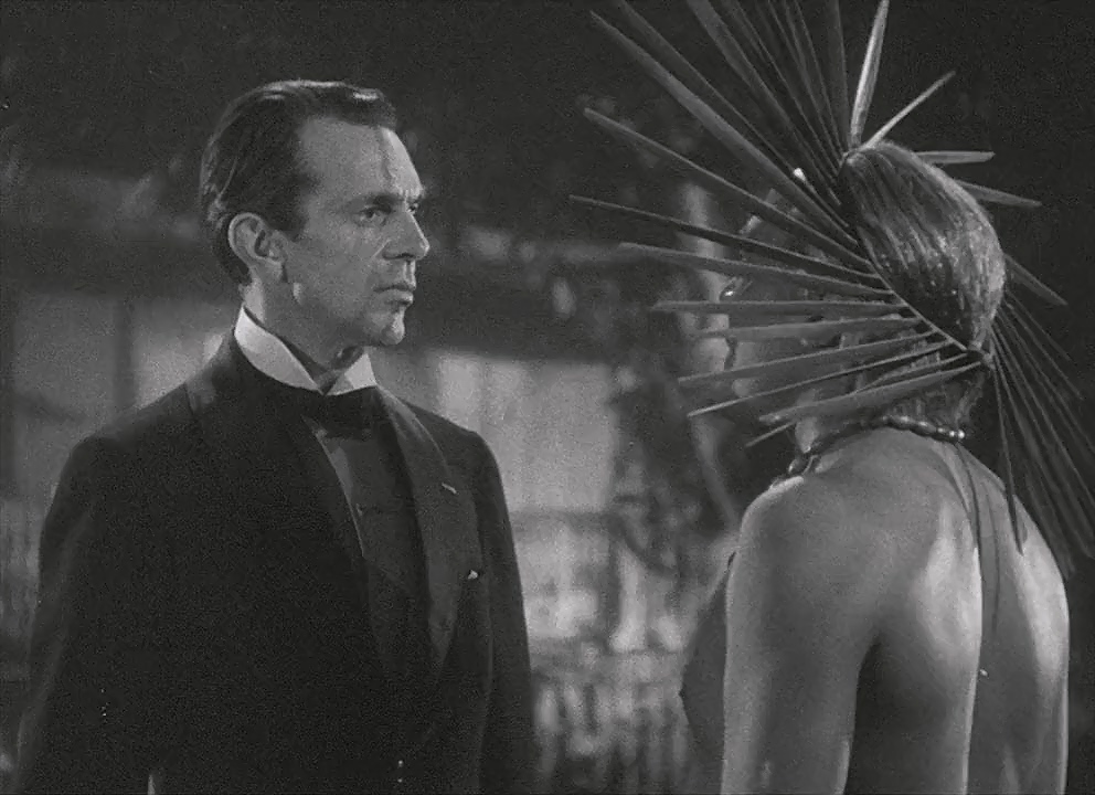 Al Kikume and Raymond Massey in The Hurricane (1937)