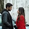 Halit Özgür Sari and Simay Barlas in Yabani (2023)