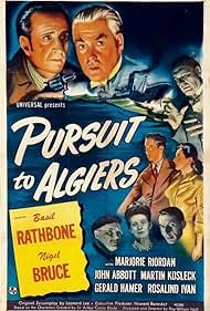 Basil Rathbone, Nigel Bruce, Rosalind Ivan, Martin Kosleck, Marjorie Riordan, and Leslie Vincent in Pursuit to Algiers (1945)