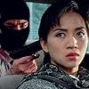 Anita Mui in Kap ba ba dik sung (1995)