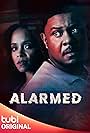 Pooch Hall and Brittany Baker in Alarmed (2023)