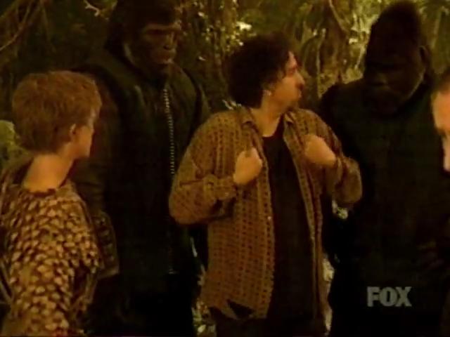 Tim Burton, Luke Eberl, Kevin Grevioux, and Isaac C. Singleton Jr. in Planet of the Apes: Rule the Planet (2001)