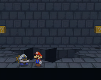 Large hole behind Gloomtail room post Shadow Queen, leading to Grodus room. Note that this place is inaccessible through normal means and can only be accessed by glitches or cheats.