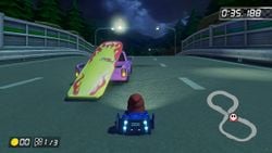 A close-up screenshot of a truck carrying a surfboard in Mario Kart 8 Deluxe