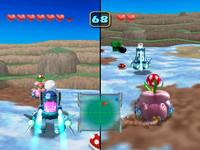 Screenshot of the duel in Random Ruckus from Mario Party 5. This is a tournament match on hard difficulty, where Mario is a player while Wario is a CPU.