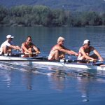 A team of rowers in their boat