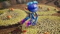 A Grubchucker shaking Pikmin off of its leg.