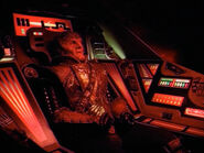 Ambassador G'Kar inside cockpit.