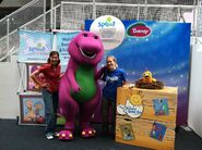 Barney promoting Sprout at a convention