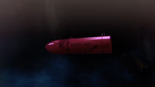 Bayonetta's lipstick, it written "Balder and Rosa"