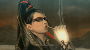 Bayonetta enjoying one of her Bloody Rose Lollipops.