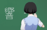 Kyōko introduces herself to the classroom.