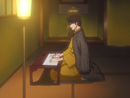 Aizen writes a letter to Hinamori.