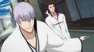 Gin blocks Aizen's Shikai power.