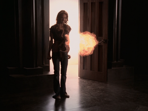 Christy attacks Billie and the Charmed Ones with a fireball.