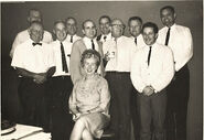 Back Row: Julius Svendsen, Art Stevens, Jack Boyd, Elmer Plummer, Jim Swain Front row: Hamilton Luske, Jimmy Trout, Joe Hale, Mac Stewart, John Emerson Seated: Secretary, Mary Satterwhite