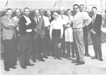 A 1965 group photograph of Disney artists in the WED parking lot in Glendale, California, from left to right: Herbert Ryman, Ken O'Brien, Collin Campbell, Marc Davis, Al Bertino, Wathel Rogers, Blair, T. Hee, Blaine Gibson, X. Atencio, Claude Coats, and Yale Gracey.