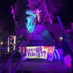 Inflatable Rex prop at Typhoon Lagoon's H2GLow nighttime party