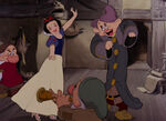 Snow White dancing with Dopey