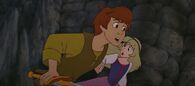 Taran and Eilonwy flee the castle