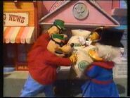 Beagle Boys have a tug-of-war with Scrooge and Launchpad at Disneyland