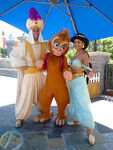 Abu with Aladdin and Jasmine at one of the Disney Parks