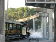 The "Roger E. Broggie" departing the Walt Disney World Railroad's "Rectangular" Roundhouse for work.