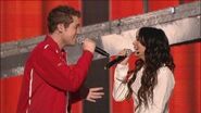 Drew Seely and Vanessa Hudgens singing during High School Musical: The Concert