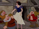 Snow White and the dwarfs dancing