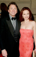 Amy Yasbeck with her husband, John Ritter attending the 2001 People's Choice Awards.