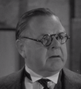 Alcalde Lovett (Gene Lockhart) en ¿Conocen a John Doe?