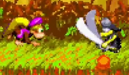 Dixie Kong facing a yellow Kutlass, as seen in the game Donkey Kong Country 2 for GBA.