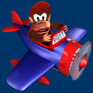 Artwork of Diddy Kong piloting an airplane.