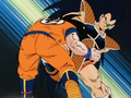 Raditz knees Goku in the stomach