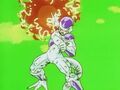 Frieza charges a ki blast to fire at Super Saiyan Goku