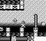 Mega Man utilizando Ice Slasher para congelar 1 bloque incinerador en "Mega Man: Dr. Wily's Revenge", Game Boy.