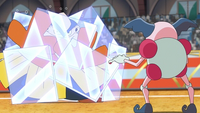 Mr. Mime de Delia usado por Ash usando Reflejo contra Hariyama de Hodge.