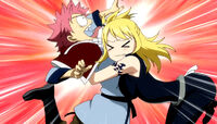 Lucy hugs Natsu