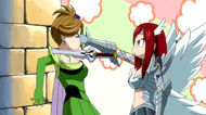 Erza beats Eve