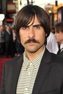 Jason Schwartzman as Luigi (costume that looks just like Luigi's outfit with a stick-on mustache)