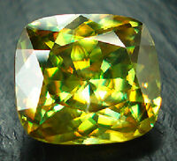 Faceted yellow sphene with green flashes photo by American-Thai Trading used by permission