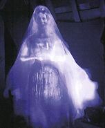 Constance as the ghost of the Attic.