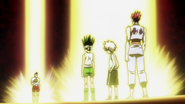 Gon, Killua, and Hisoka standing in front of Razor