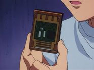 Gon holding a memory card