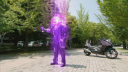 he is covered in a purple energy light in order to...